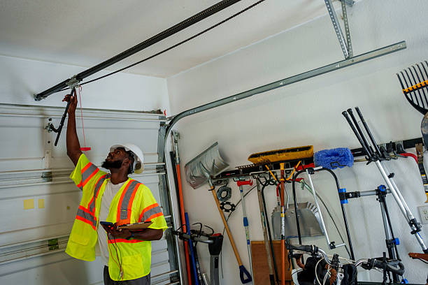 Professional Garage Door Panel Replacement technician working in Woodfin, NC