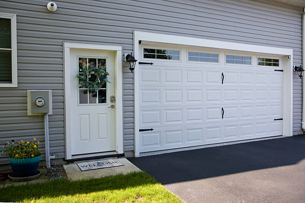 24/7 Emergency Garage Door Panel Replacement experts in Woodfin, NC